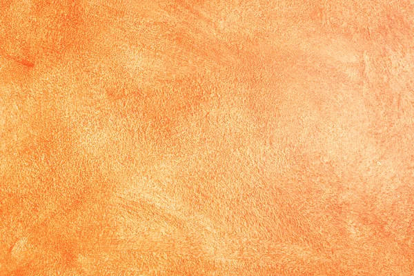 textured background - orange painted wall