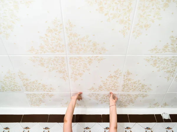 setting styrofoam ceiling tiles