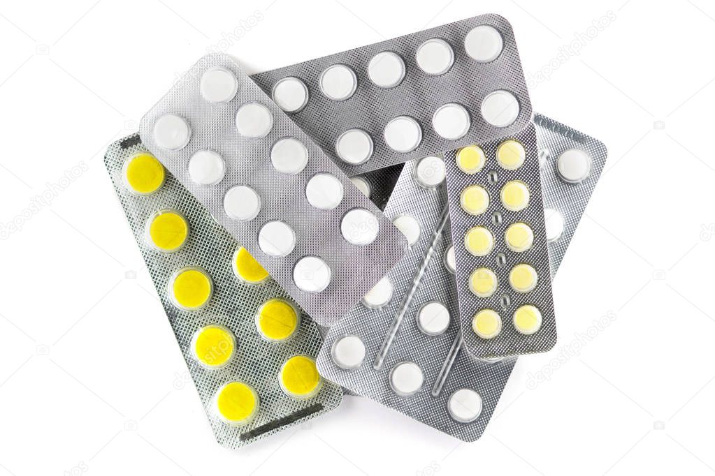 Tablets yellow and white in the package