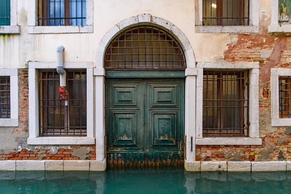 Vintage buildings by canal in Venice, Italy