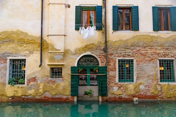 Vintage buildings by canal in Venice, Italy