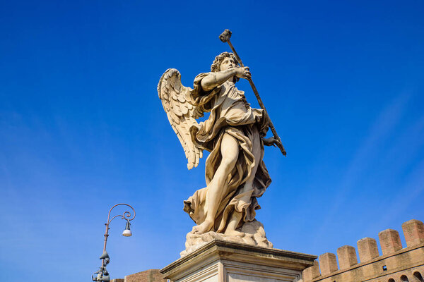 Statue of angel on Ponte Sant'Angelo, a Roman bridge in Rome, Italy