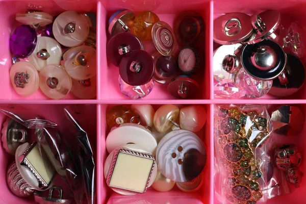 colorful button clothes in the box