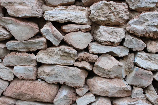 Brązowe Kamienie Ułożone Formie Ściany — Zdjęcie stockowe