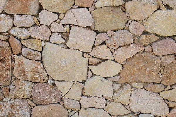 Vägg Bruna Stenar Staplade Och Limmade Med Cement — Stockfoto