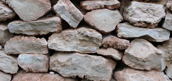 Ścianie Brązowe Kamienie Ułożone Klejone Cementu — Zdjęcie stockowe