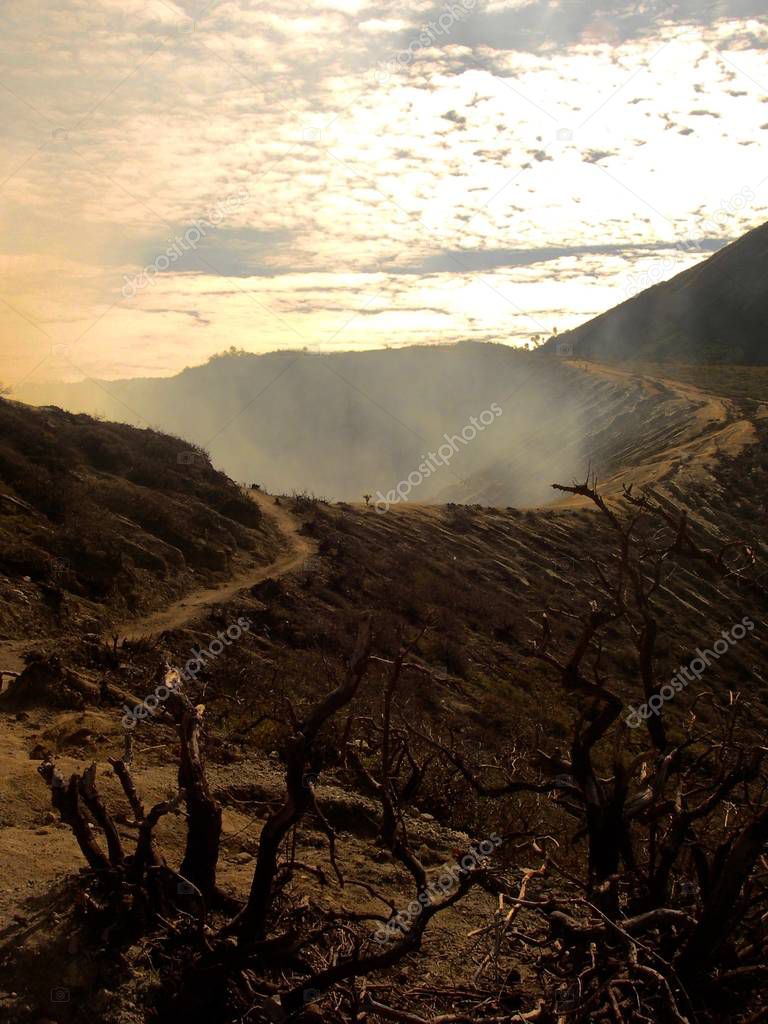view on the crater of the Ijen volcano in Indonesia, a sulfur mine and toxic gaz