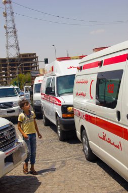 Ambulans'ın hattı Irak Kürdistan Erbil Governate binada bir İslam devleti saldırı mahallinde