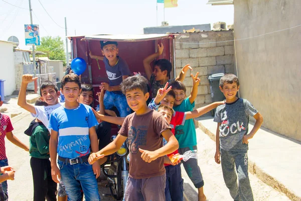 Suriye mülteci çocuklar Darashakran mülteci kampı Erbil, Irak Kürdistanı, Temmuz 2018
