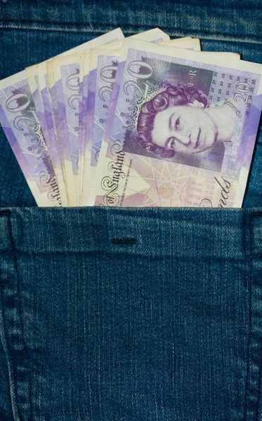 British Twenty Pound Notes in Jean\'s Back Pocket fanned