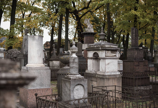 Necropolis of the 18th century of the Alexander Nevsky Lavra in St. Petersburg, historical cemetery and old graves, stone sculptures