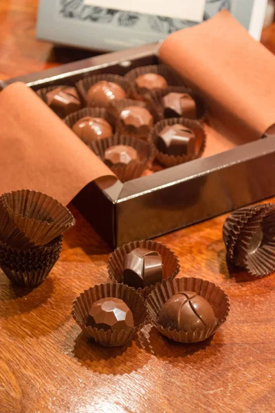 Open box of filled chocolate. Making homemade artisan chocolate sweets with different fillings for a special ocassion: valentine\'s day, a birthday or anniversary gift or the perfect souvenir