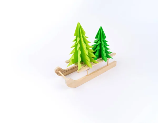Green Christmas Tree Made Paper Wooden Sled Riding White Background — Stock Photo, Image