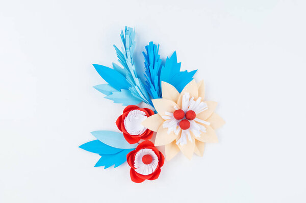 Paper flower for Christmas decor. Color coral fashion pastel. Handmade children's creativity. white background. Cozy new year.