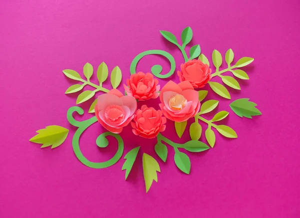 Flower made of paper pink background. Trend color pastel coral.