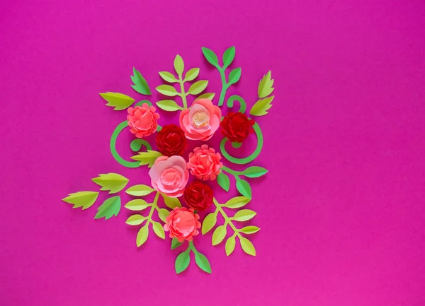 Flower made of paper pink background. Trend color pastel coral.