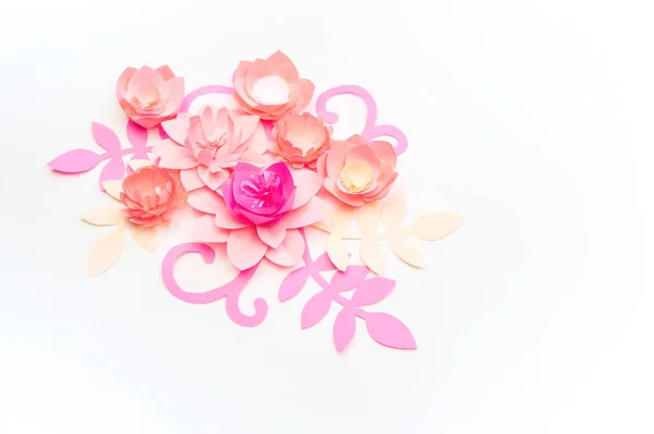 Flower made of paper white background. Trend color pastel coral.