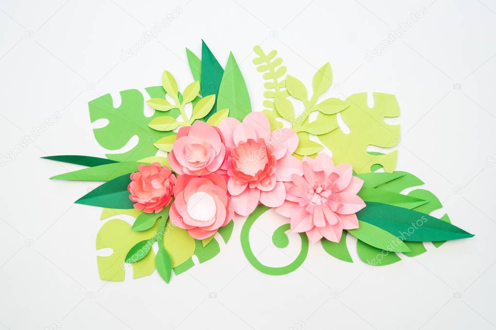 Flower made of paper white background. Trend color pastel coral.