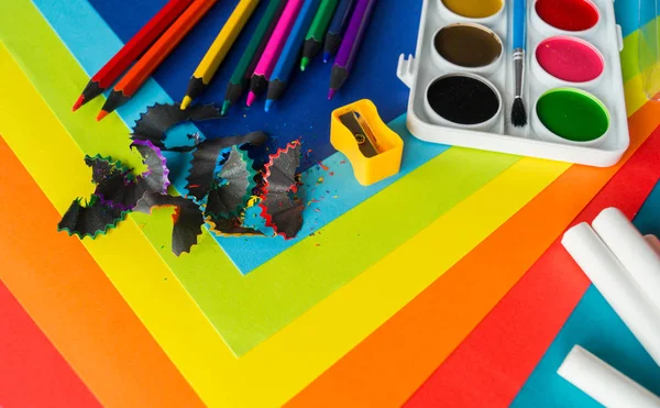 Stationery for study at school lies on blue. Back to school. Rainbow color — Stock Photo, Image