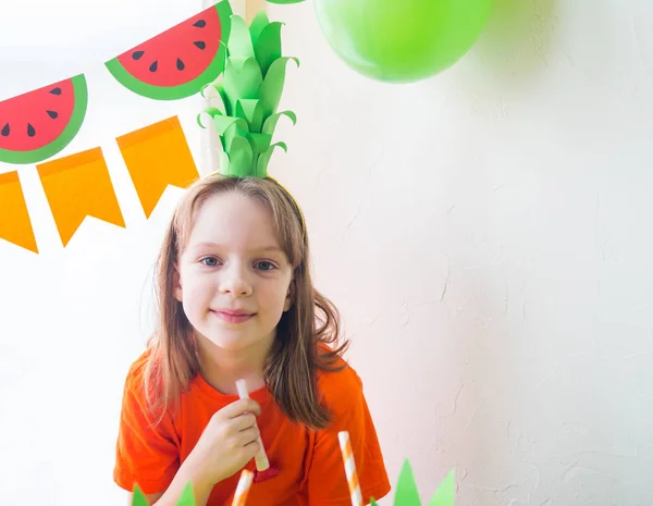 Children celebrate a birthday. Pineapple and watermelon costume. Fruit Party.