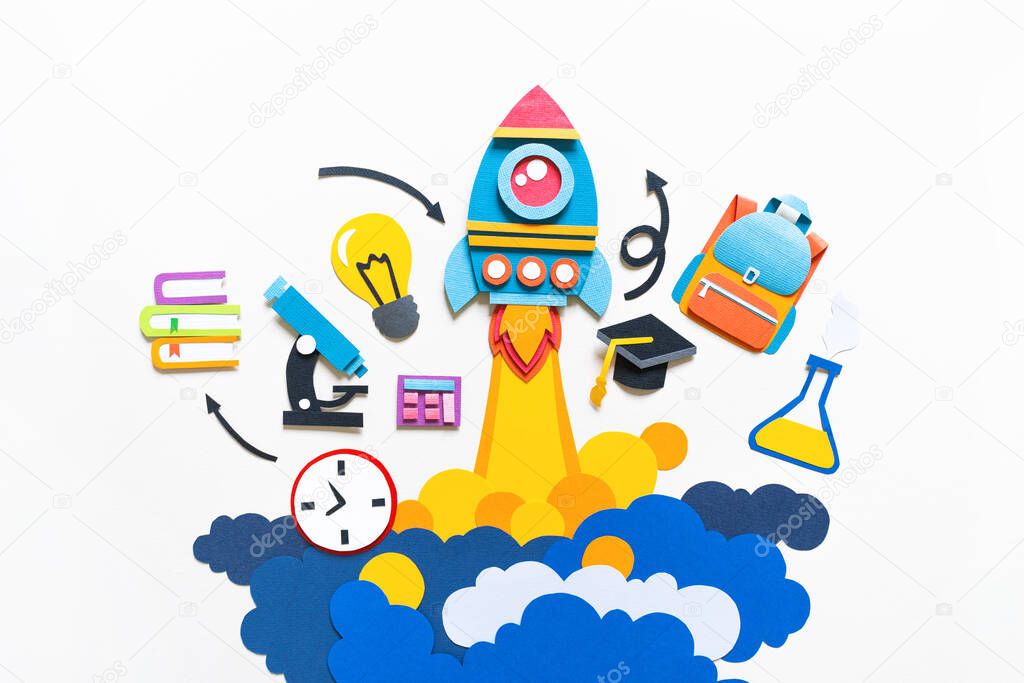 Rocket takes off paper craft. Back to school. Copy space. White background. Education concept
