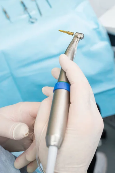 A modern implantation tool is fixed on a dental drill. Close up, macro photo. — Stock Photo, Image