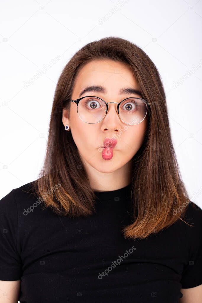 funny girl with glasses makes lips bow