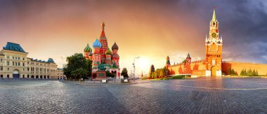 Panorama in Moscow at sunrise, Red square with saint Basil in Ru clipart