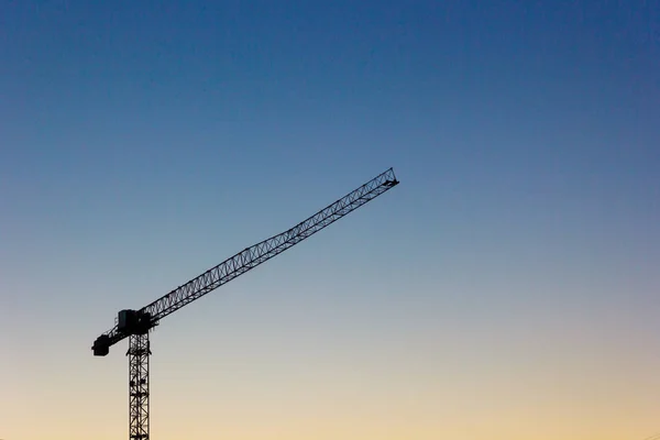 Silhouette de grue de construction — Photo