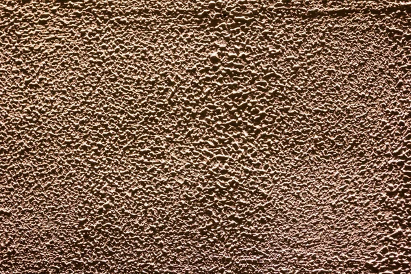 texture of the wall covered with relief plaster