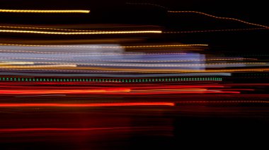 Kasıtlı kamera hareketi soyut bir kadeh gece şehir ışıkları. Arka plan tasarımı için.