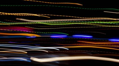 Kasıtlı kamera hareketi soyut bir kadeh gece şehir ışıkları. Arka plan tasarımı için.