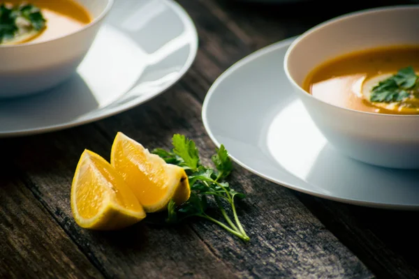 Lentil Pumpkin Soup Slice Lemon Parsley White Plate — Stock Photo, Image