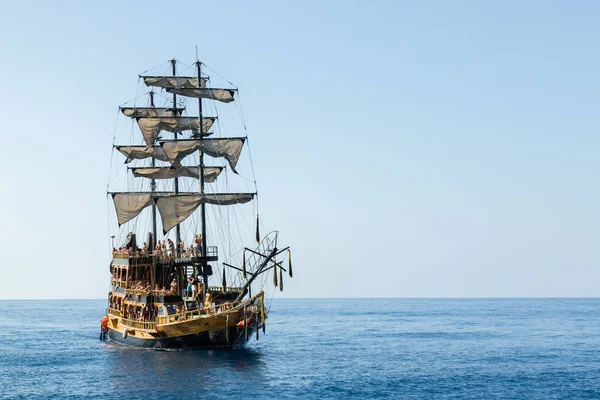 Pirate ship at sea with tourists. Excursion