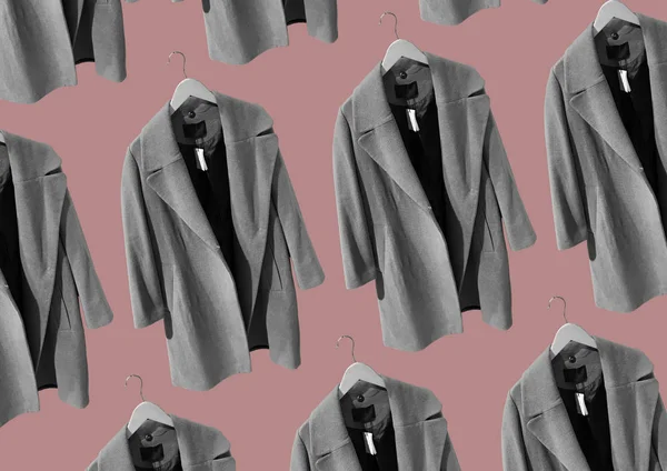 黑白女性外套在挂架上隔离在粉红色背景 衣服的组成 顶视图 复制空间 女衣大衣冬季服装图案 严格的经典棕色外套 — 图库照片