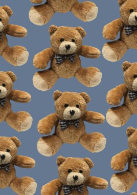 Kahverengi sevimli oyuncak ayı mavi arka planda izole edilmiş. Oyuncak ayı peluş deseni. Çocuk konsepti. Oyuncakların bileşimi. Düz yerde, üst tarafta. Boşluğu kopyala