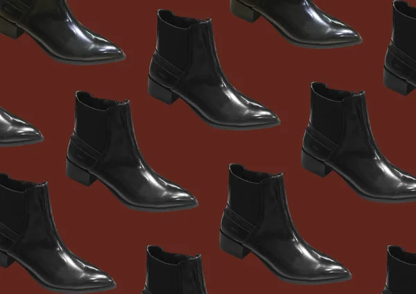 精致的黑色靴子在红色背景上被隔离 时尚女靴女式半季休闲鞋 低跟靴 尖尖的脚趾鞋 鞋的样式 — 图库照片