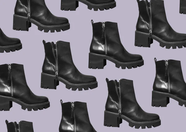 Schwarze Lederstiefel Auf Dicken Sohlen Und Hohe Absätze Auf Lila — Stockfoto