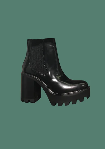 Black platform high-heel ankle boots isolated on green background. Women Casual Platform High Heel Boots. Female black boots on thick soles and high heels. Women's demi-season shoes pattern