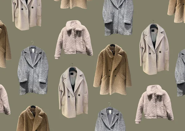 Fashionable winter jacket with fur. Composition of clothes isolated on green. Flat lay, top view, copy space. Ladies\' Trench Coat. Winter clothes pattern. Strict classic brown coat. Banner concept