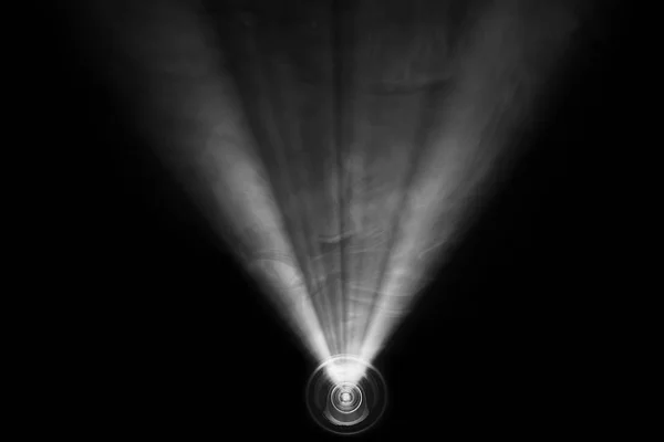 beautiful black and white color wide lens projector with light beam for movie and cinema at night . smoke texture spotlight . screening for multimedia . abstract background .