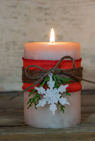 Christmas time Advent candle with decorations