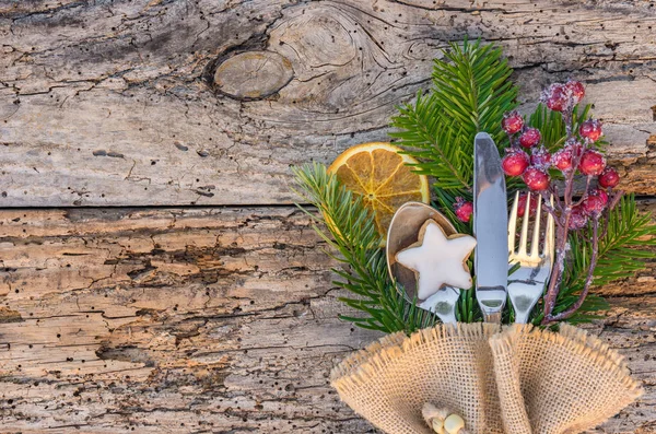 Christmas dinner menu table place setting on rustic wood background, copy space