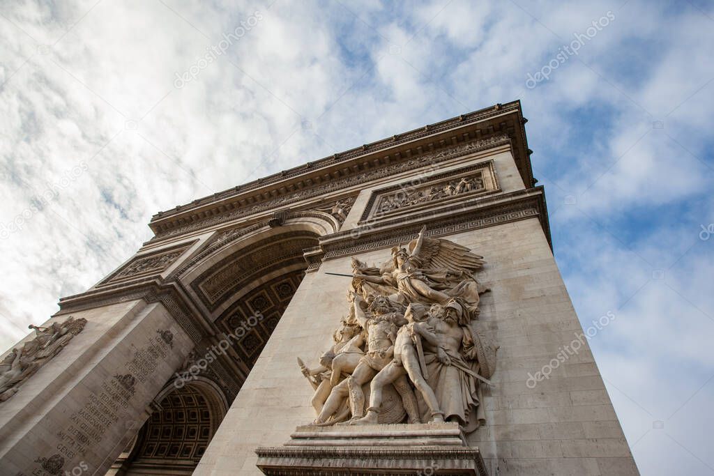 Detail architecture of Arc de Triomphe monument in Paris, France.