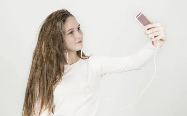 Bright Beautiful Girl Headphones Phone Her Hands Listens Music Makes — Stock Photo, Image