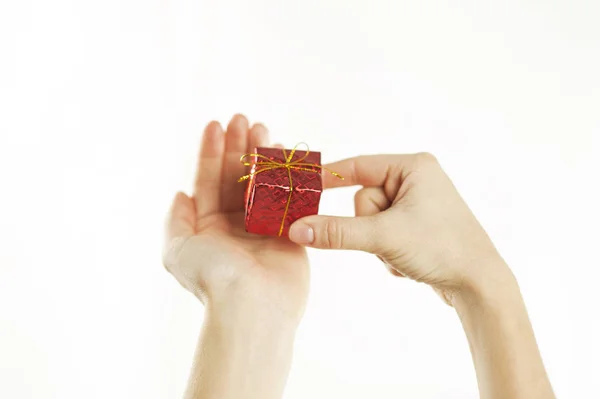 Small Red Gift Gentle Hands Young Girl White Isolated Background — Stock Photo, Image