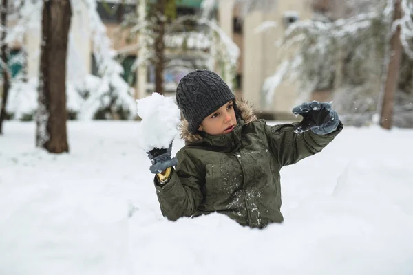 Boy Trowing Snowball Outdoor — Stock Photo, Image