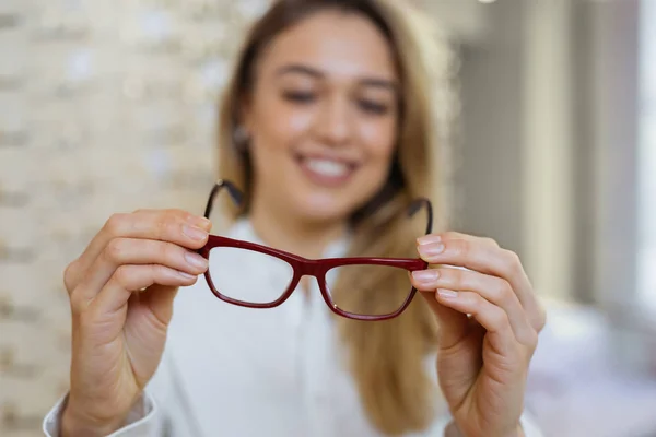 Woman Holding Eyeglasses Camera — 스톡 사진