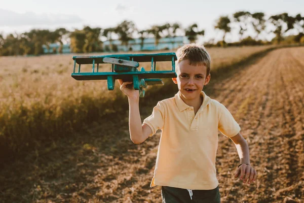 Cute Boy Playing Toy Airplane Outdoor Meadow — Stock Photo, Image