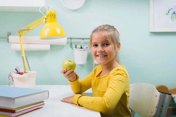 Schoolgirl Her Room Sitting Table Holding Apple — Stock Photo, Image